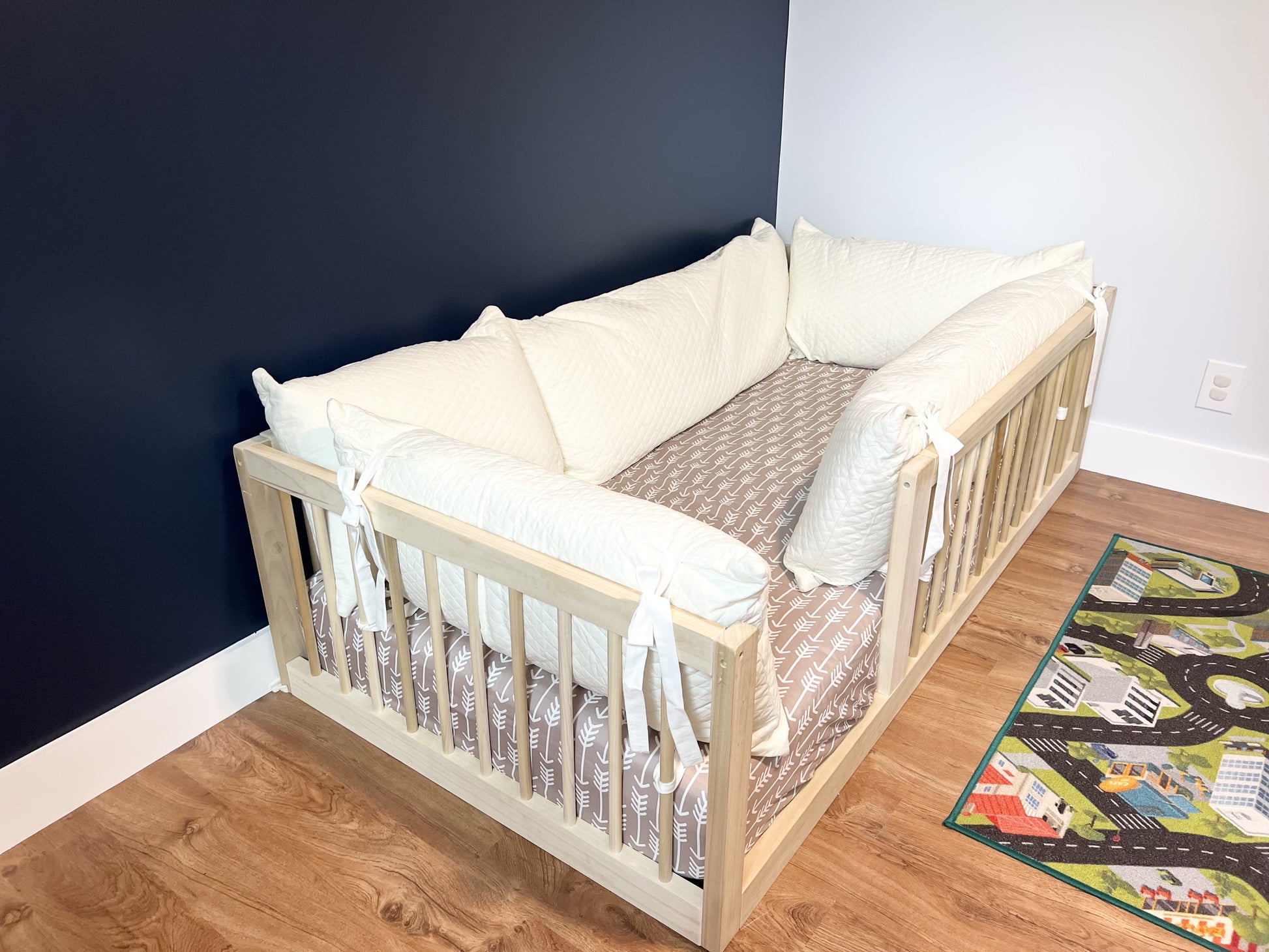 Montessori floor bed, natural poplar hardwood, non-toxic, diamond pillow cover and book organizer.