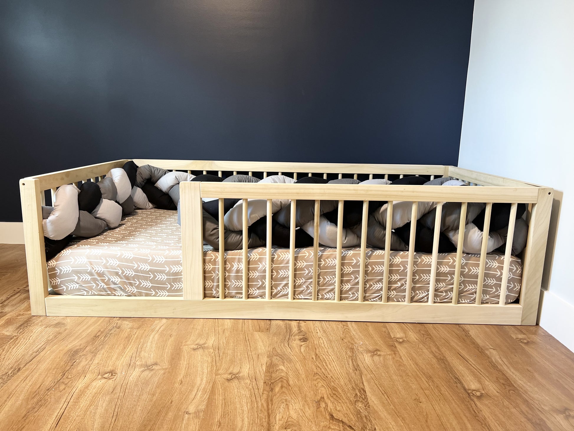 Montessori floor bed, natural poplar hardwood, non-toxic, with tri color braided bumper.