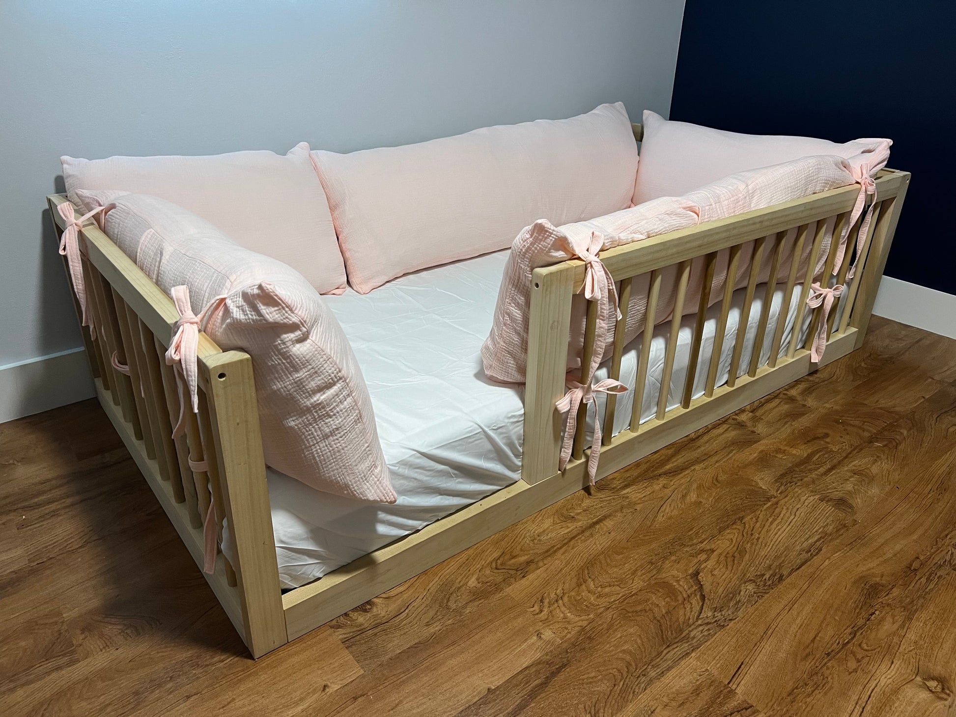 Soft cotton pillow cover on floor bed.